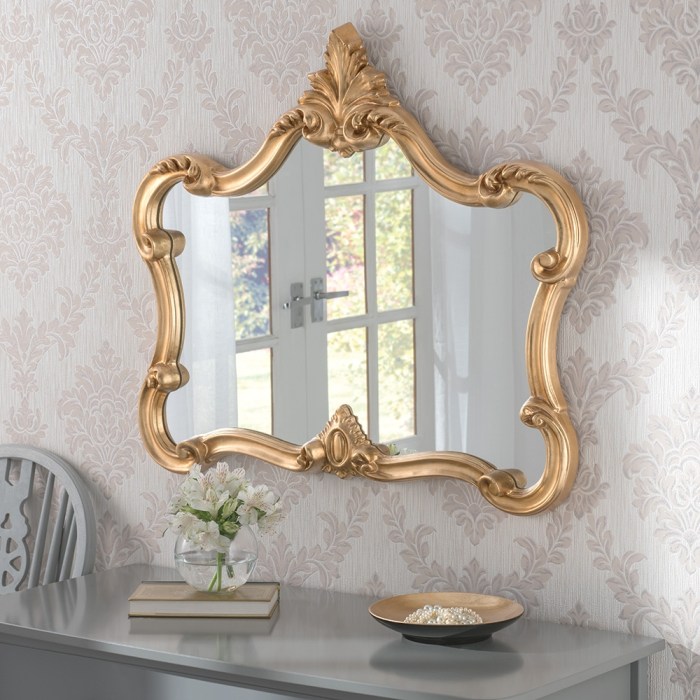 How to decorate bedroom with gold framed mirror